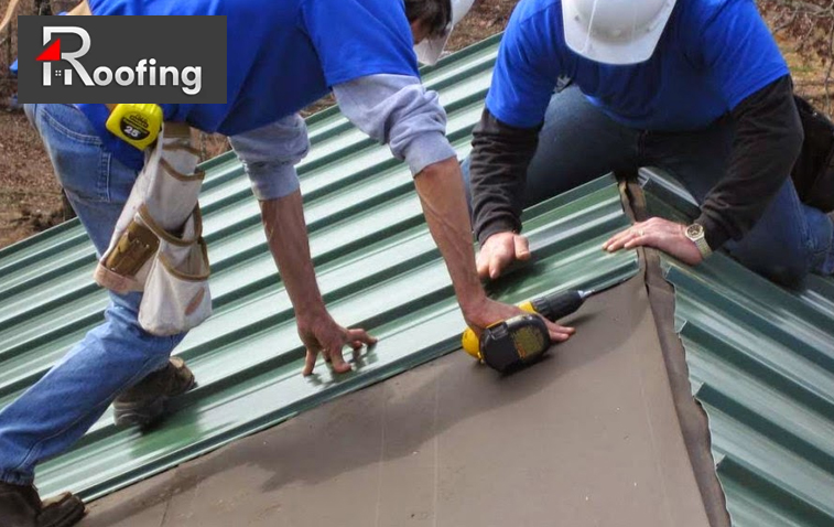 Roofers Installing a metal roof 