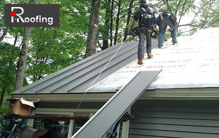 Professional measuring and planning for metal roof installation