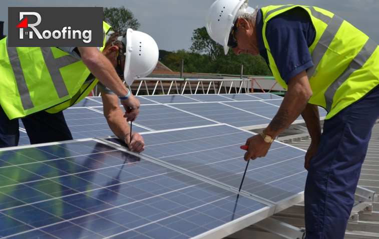 Professional installing solar panels on a roof