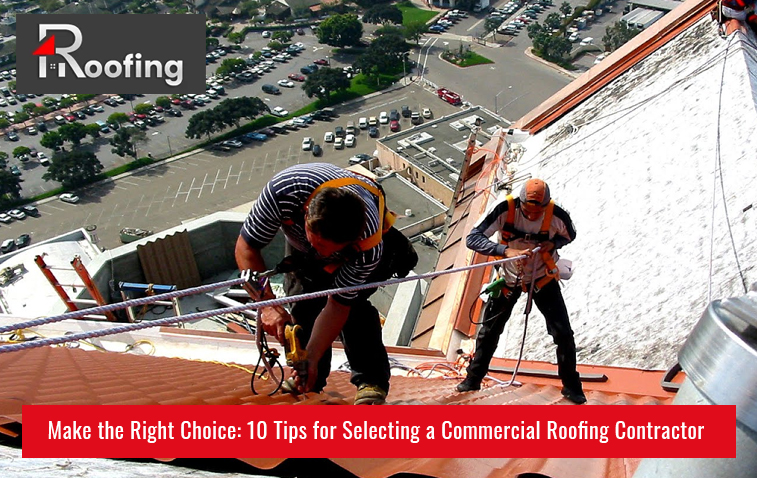 Roofing contractors working on a commercial roof.