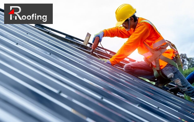 Roofing professionals from a commercial roofing contractor installing new roofing.